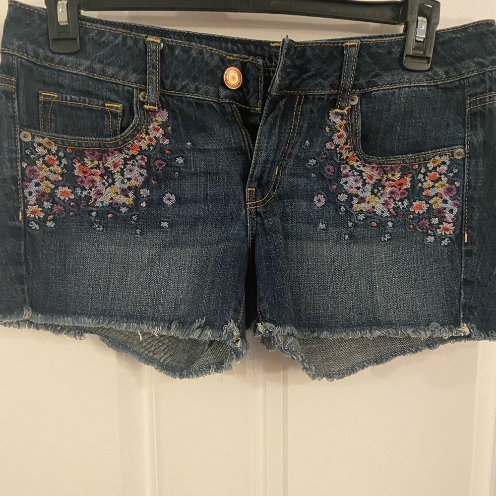 American Eagle denim shorts with embroidered flowers